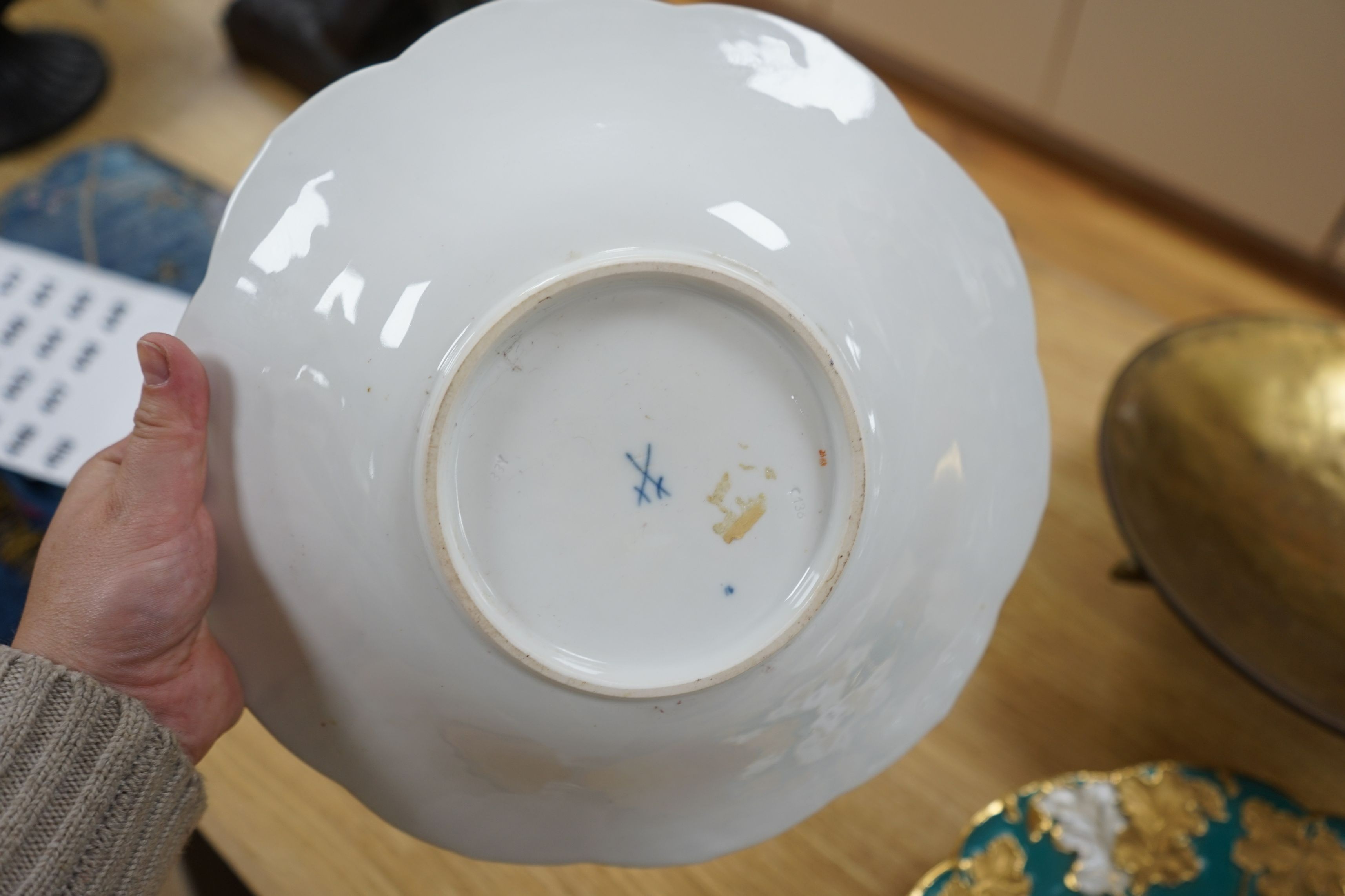 Two Meissen floral and gilt dishes and another shallower dish, 28cms diameter (3)